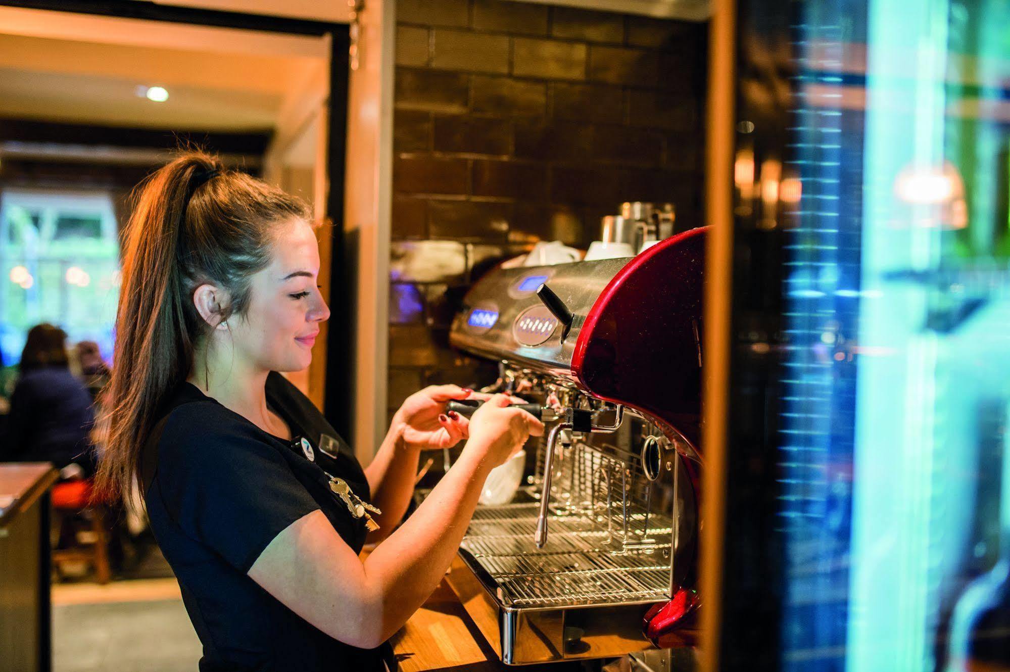 The Millstone, Mellor Otel Blackburn  Dış mekan fotoğraf A barista making coffee